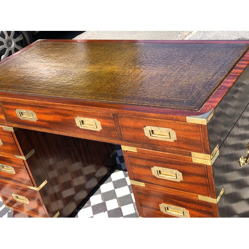 379 - CAMPAIGN STYLE PEDESTAL DESK, 78cm H x 122cm W x 60cm D, mahogany and brass bound, with green leathe... 