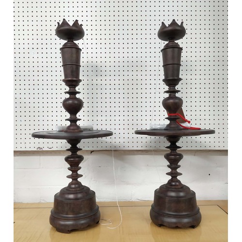 424 - JULIAN CHICHESTER 'KATHRYN'S CANDLESTICK', a pair, 75cm H, aged mahogany. (2)