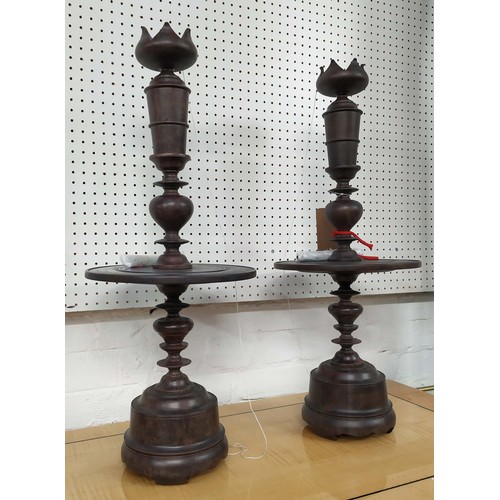 424 - JULIAN CHICHESTER 'KATHRYN'S CANDLESTICK', a pair, 75cm H, aged mahogany. (2)