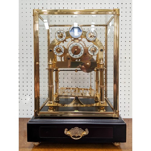 597 - CONGREVE CLOCK, 30cm x 27cm, in glass case, moon phase function, comes with box.