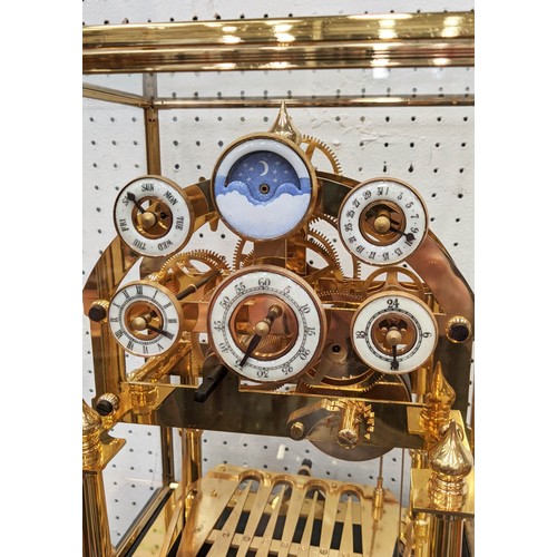 597 - CONGREVE CLOCK, 30cm x 27cm, in glass case, moon phase function, comes with box.