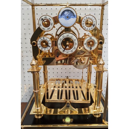 597 - CONGREVE CLOCK, 30cm x 27cm, in glass case, moon phase function, comes with box.