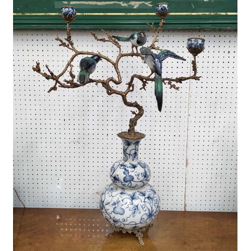 595 - CANDELABRA, 72cm H, glazed ceramic with gilt mounts, three branch.