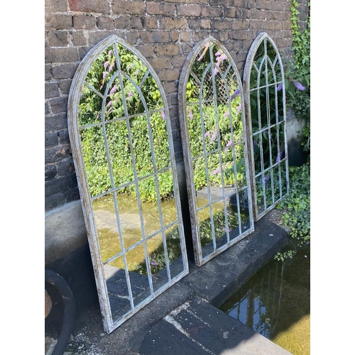 544 - ARCHITECTURAL WALL MIRRORS, 160cm high, 67cm wide, set of three, Gothic style, arched design aged pa... 