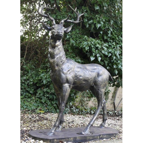 549 - SCULPTURAL STUDY OF A STAG, 154cm H x 105cm W x 50cm D, cast metal, bronzed finish.