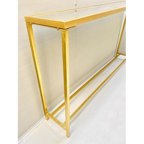 519 - CONSOLE TABLE, 79cm high x 152cm wide x 25cm deep, mirrored glass top, gilt metal frame.