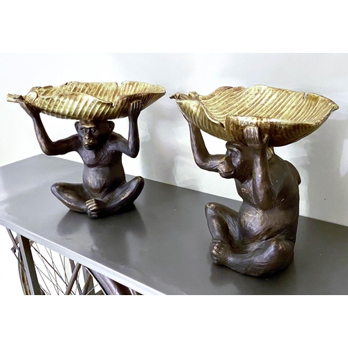 527 - TRINKET DISHES, pair, in the form of Monkeys holding gilt Banana leaves aloft, 33cm x 40cm x 18cm (2... 