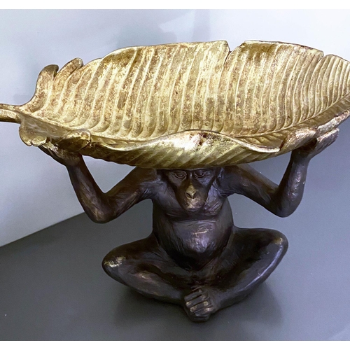 527 - TRINKET DISHES, pair, in the form of Monkeys holding gilt Banana leaves aloft, 33cm x 40cm x 18cm (2... 