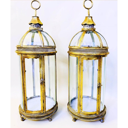 528 - STORM LANTERNS, pair, 80cm high, 28cm diameter, Regency style, gilt metal and glass (2)