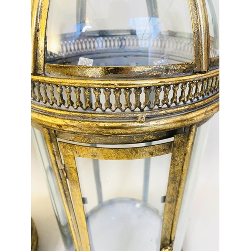 528 - STORM LANTERNS, pair, 80cm high, 28cm diameter, Regency style, gilt metal and glass (2)