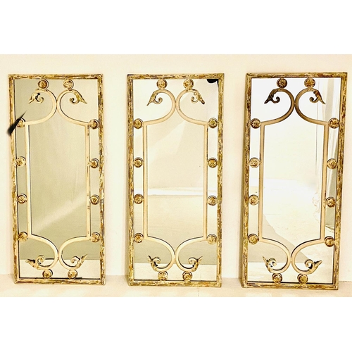 530 - ARCHITECTURAL WALL MIRRORS, set of three, 112cm high, 48cm deep, regency style, aged white painted m... 