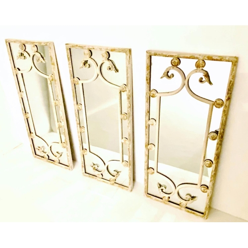 530 - ARCHITECTURAL WALL MIRRORS, set of three, 112cm high, 48cm deep, regency style, aged white painted m... 