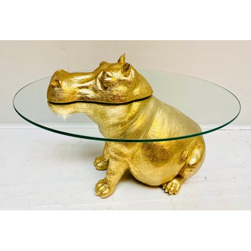 609 - HIPPOPTAMUS LOW TABLE, 65cm x 50cm x 45cm, gilt resin and glass.