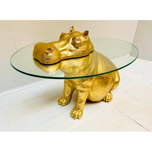 609 - HIPPOPTAMUS LOW TABLE, 65cm x 50cm x 45cm, gilt resin and glass.