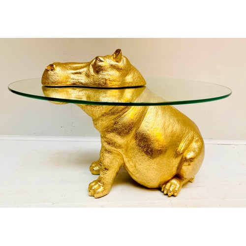 609 - HIPPOPTAMUS LOW TABLE, 65cm x 50cm x 45cm, gilt resin and glass.