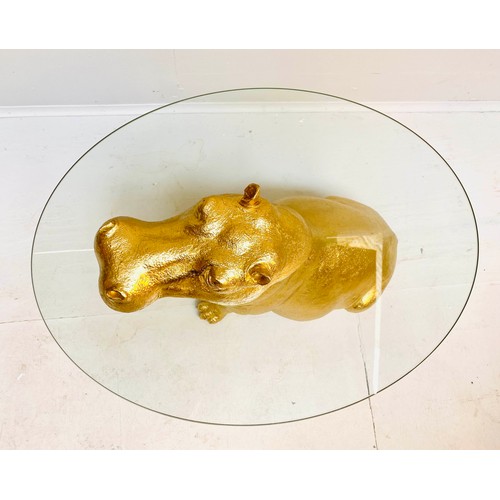 609 - HIPPOPTAMUS LOW TABLE, 65cm x 50cm x 45cm, gilt resin and glass.