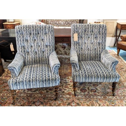 115 - LIBRARY ARMCHAIRS, a pair, 93cm H x 71cm W, Victorian mahogany with stripped upholstery, on raised c... 