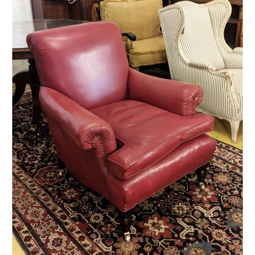 125 - ARMCHAIR, 90cm H x 82cm W, Victorian Howard style, with studded red leather upholstery.