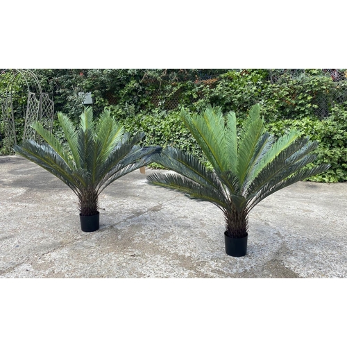 444 - FAUX FERN TREES, a pair, potted, 110cm high, 100cm wide. (2)