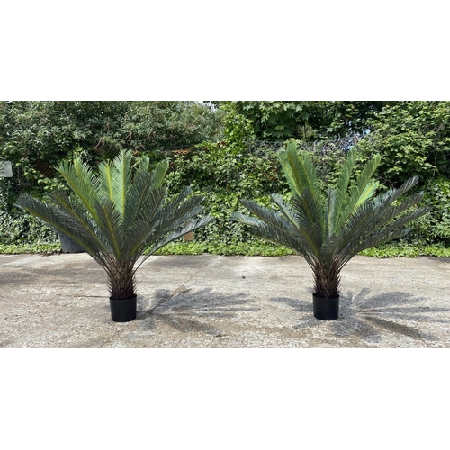 444 - FAUX FERN TREES, a pair, potted, 110cm high, 100cm wide. (2)