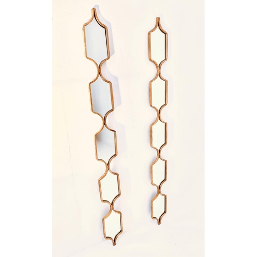 445 - ACCENT WALL MIRRORS, a pair, gilt frames, 144cm x 14cm. (2)