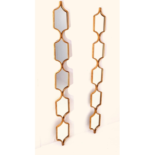 445 - ACCENT WALL MIRRORS, a pair, gilt frames, 144cm x 14cm. (2)