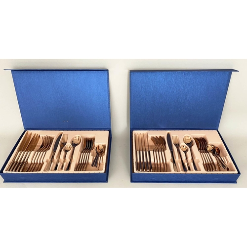 448 - CANTEEN CUTLERY SETS, a pair, each with four place settings, coppered metal, blue cases, 5cm x 41cm ... 