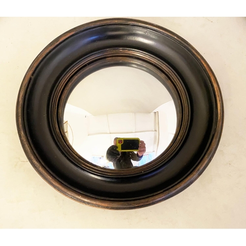 458 - CONVEX MIRRORS, set of twelve, Regency style of various sizes, all with ebonised frames, 26cm diamet... 