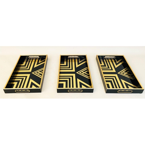 461 - COCKTAIL TRAYS, 5cm high, 40cm wide, 25cm deep, Art Deco style gold geometric designs. (3)