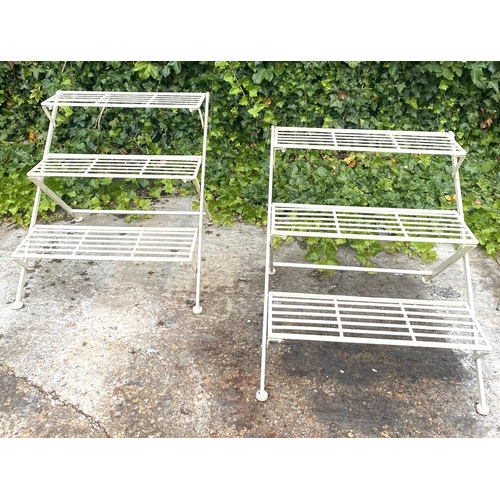 499 - GARDEN ETAGERES, a pair, 63cm H x 62cm W x 60cm D, three tier, white painted metal. (2)