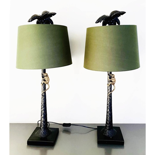 502 - TABLE LAMPS, a pair, 84cm high x 36cm diameter, green shades, palm tree bases with a climbing monkey... 