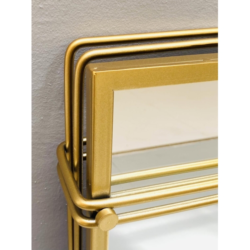 506 - WALL MIRRORS, a pair, 81cm high, 51cm wide, 1960's French style, gilt metal frames. (2)