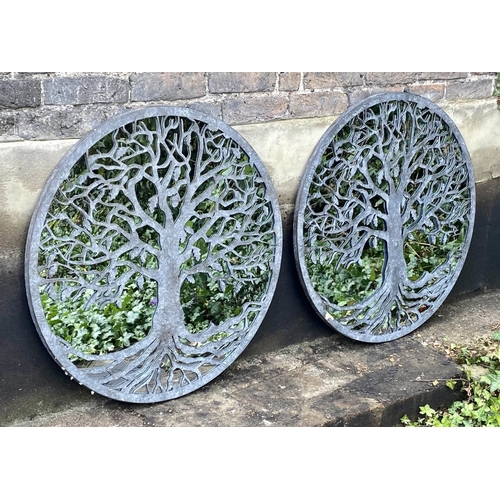 516 - GARDEN WALL MIRRORS, a pair, 80cm diameter, overlaid decoration with tree design. (2)