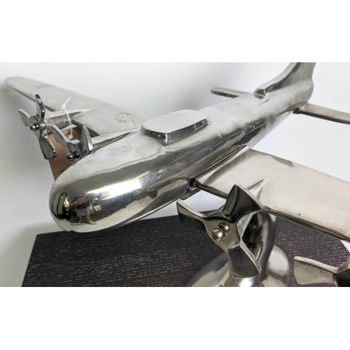 522 - SCULPTURAL AEROPLANE, polished metal, 46.5cm H.