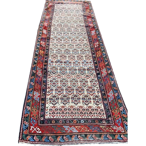 65 - ANTIQUE SHIRVAN RUNNER, 260cm x 94cm.