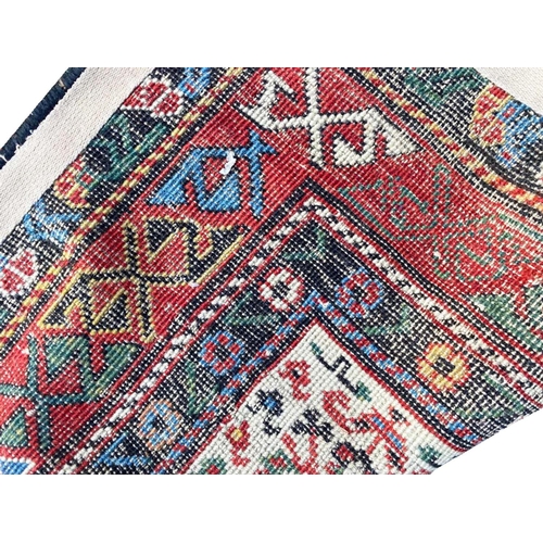 65 - ANTIQUE SHIRVAN RUNNER, 260cm x 94cm.