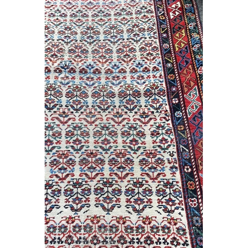 65 - ANTIQUE SHIRVAN RUNNER, 260cm x 94cm.