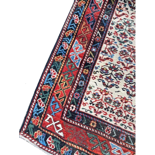 65 - ANTIQUE SHIRVAN RUNNER, 260cm x 94cm.