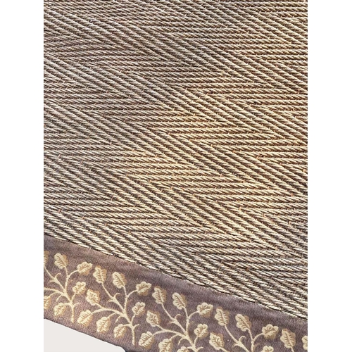 67 - HERRINGONE JUTE CARPET, 330cm x 300cm.