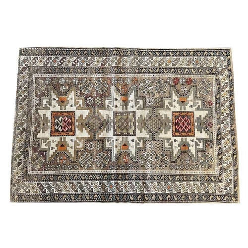 79 - ANTIQUE RUGS, a collection of three, largest 200cm x 136cm. (3)