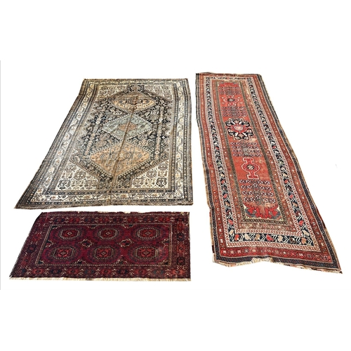 80 - ANTIQUE RUGS, a collection of three, largest 330cm x 97cm. (3)