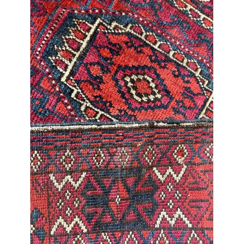 80 - ANTIQUE RUGS, a collection of three, largest 330cm x 97cm. (3)