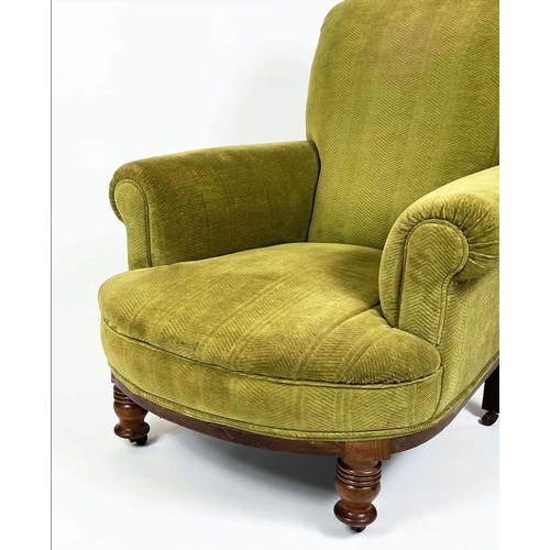 81 - ARMCHAIR, Victorian Howard Style, upholstered in Osborne and Little moss green velvet with turned fr... 