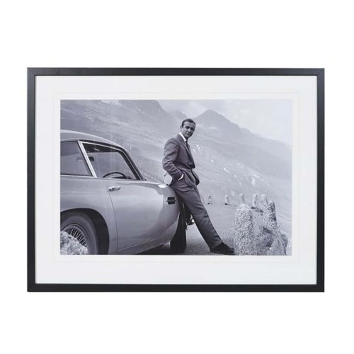 513 - SEAN CONNERY AS JAMES BOND WITH ASTON MARTIN, photographic print, framed, 63cm x 83cm.