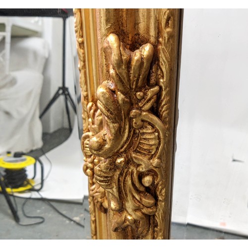 435 - PIER MIRRORS, a pair, Continental style, gilt frames, bevelled plate, 178cm x 53cm each. (2)