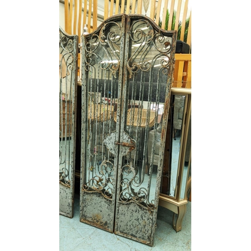 489 - ARCHITECTURAL WALL MIRRORS, a pair, each 53cm x 130cm H, behind a pair, gated design. (2)