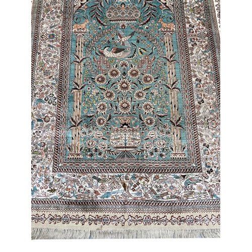 91 - FINE PURE SILK HEREKE DESIGN RUG, 178cm x 95cm.