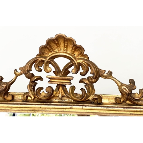 164 - OVERMANTEL MIRROR, 19th century carved giltwood arched rectangular with shell and scroll crest and m... 