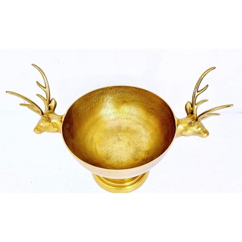 374 - CHAMPAGNE BATH, 54cm high, 75cm wide, 47cm deep, gilt metal finish, twin stag head handles.