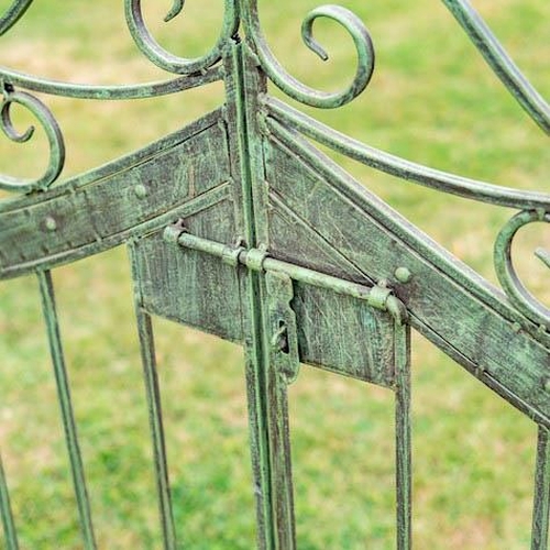 372 - ARCHITECTURAL GARDEN GATE, 250cm high, 185cm wide, 38cm deep, Regency style, aged painted finish.